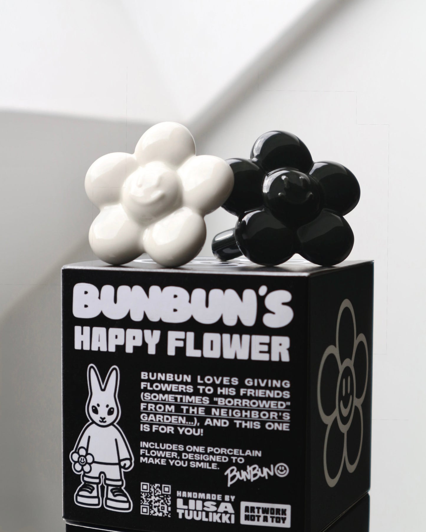 BUNBUN’S HAPPY FLOWER - collectible art toy sculpture. Black box with white and black flowers on top, featuring 'Bunbun's Happy Flower' text.